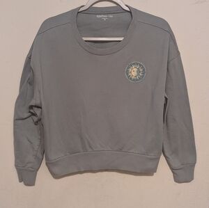 Rebellious One green sun and moon cropped sweater size small juniors